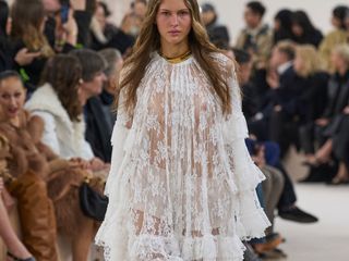 Woman in white lace Chloé dress