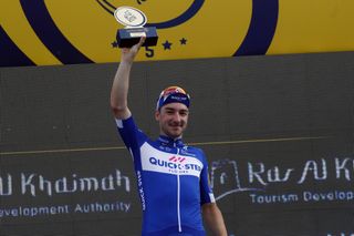 Elia Viviani gets his trophy for winning the stage
