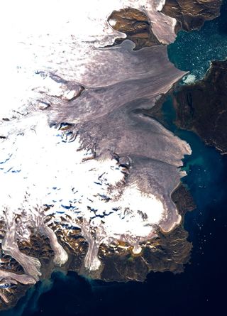 Landsat 7 ETM+ satellite image of south-east Devon Island Ice Cap, Devon Island, Nunavut, Canada. The darker ice is the result of accumulated impurities at the surface.