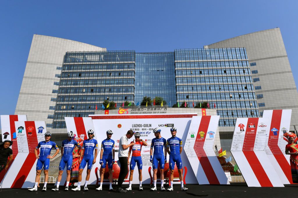Enric Mas and his Deceuninck-QuickStep team on the pre-race podium