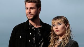 us singer miley cyrus and husband australian actor liam hemsworth arrive for the saint laurent mens spring summer 2020 runway show in malibu, california, on june 6, 2019 photo by kyle grillot afp photo credit should read kyle grillotafp via getty images