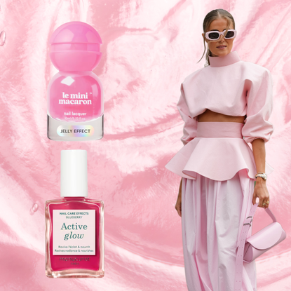 A woman in a pink outfit next to two bottles of pink nail polish