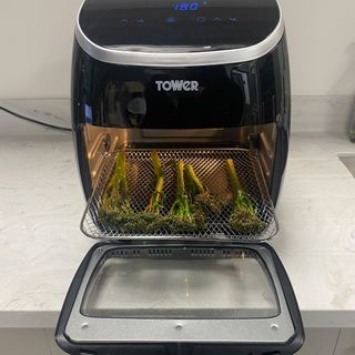 Image of broccoli being cooked in Tower air fryer