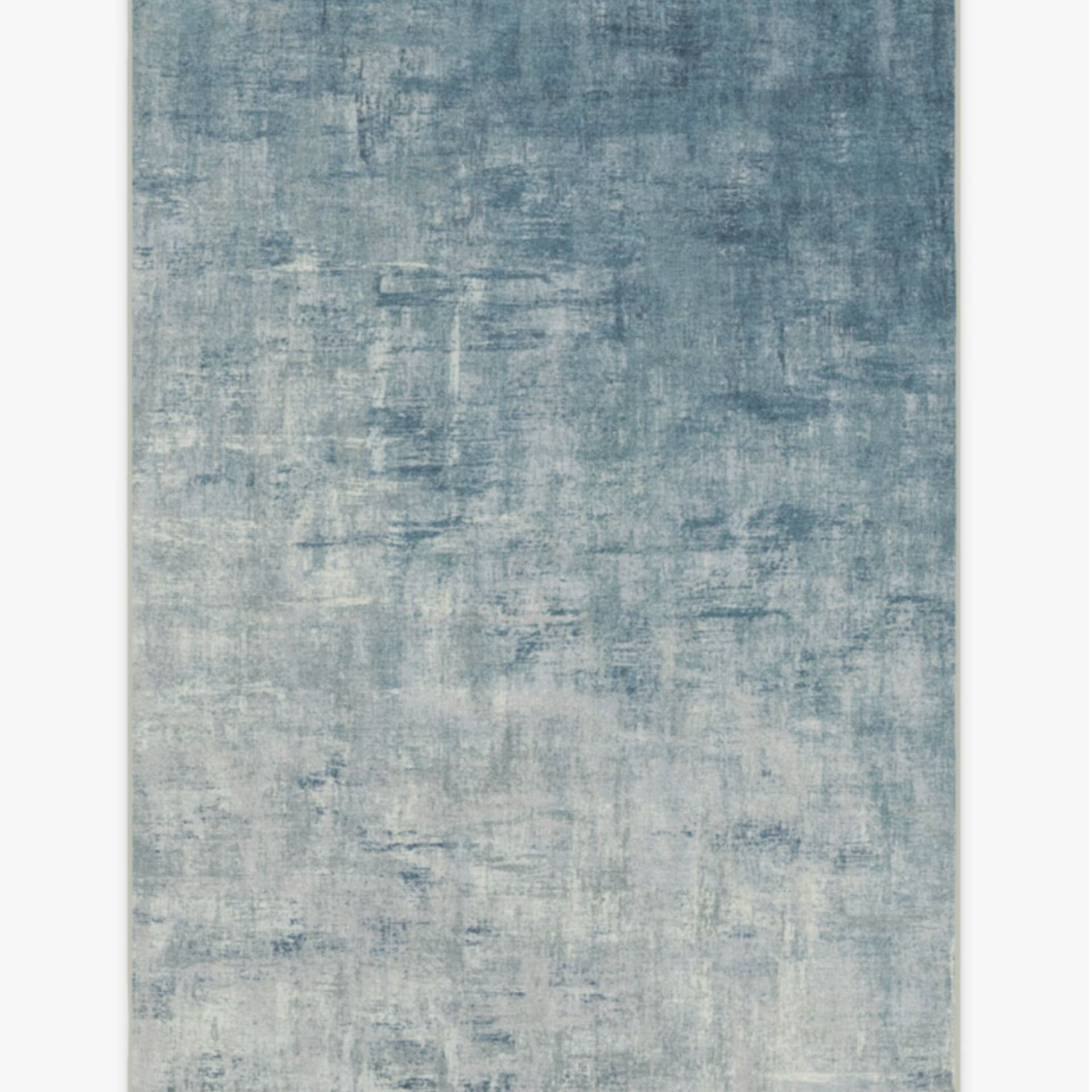 Ruggable Impasto Slate Blue Rug against a white background.