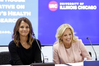 Halle Berry and first lady Jill Biden share a laugh after speaking during a roundtable discussion highlighting women's health research at University of Illinois on January 11, 2024 in Chicago, Illinois.
