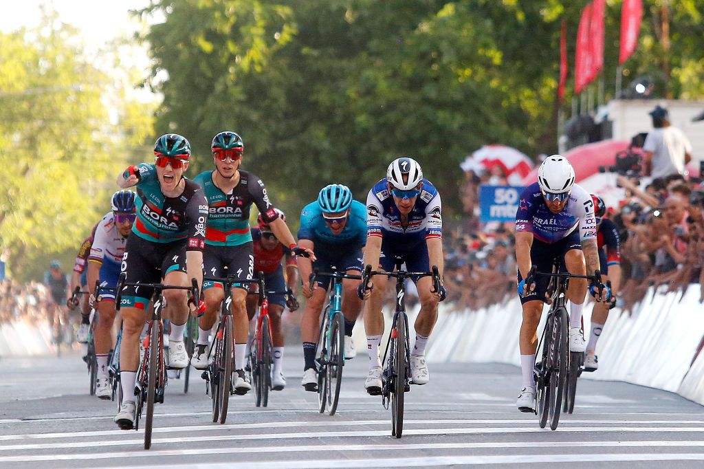 SAN JUAN ARGENTINA JANUARY 22 Sam Bennett of Ireland and Team Bora Hansgrohe celebrates at finish line as stage winner ahead of Michael Mrkv of Denmark and Team Soudal QuickStep Giacomo Nizzolo of Italy and Team Israel Premier Tech and Elia Viviani of Italy and Team INEOS Grenadiers during the 39th Vuelta a San Juan International 2023 Stage 1 a 1439km stage from San Juan to San Juan on January 22 2023 in San Juan Argentina Photo by Maximiliano BlancoGetty Images