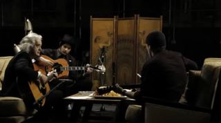 (from left) Jimmy Page, Jack White and The Edge perform in the 2008 documentary, It Might Get Loud
