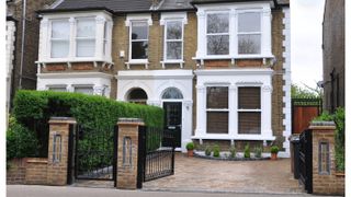 Victorian semi detached house with gated driveway