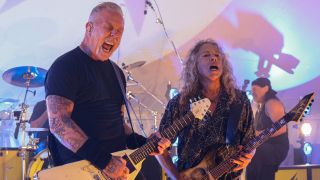 Metallica performing onstage in 2025