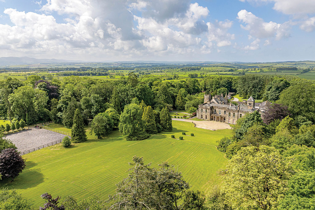 Houses for sale with beautiful fireplaces: Tallentire Hall, Tallentire, Cockermouth, Cumbria. 