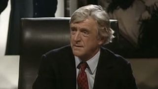 Michael Parkinson as himself looking concerned in Ghostwatch