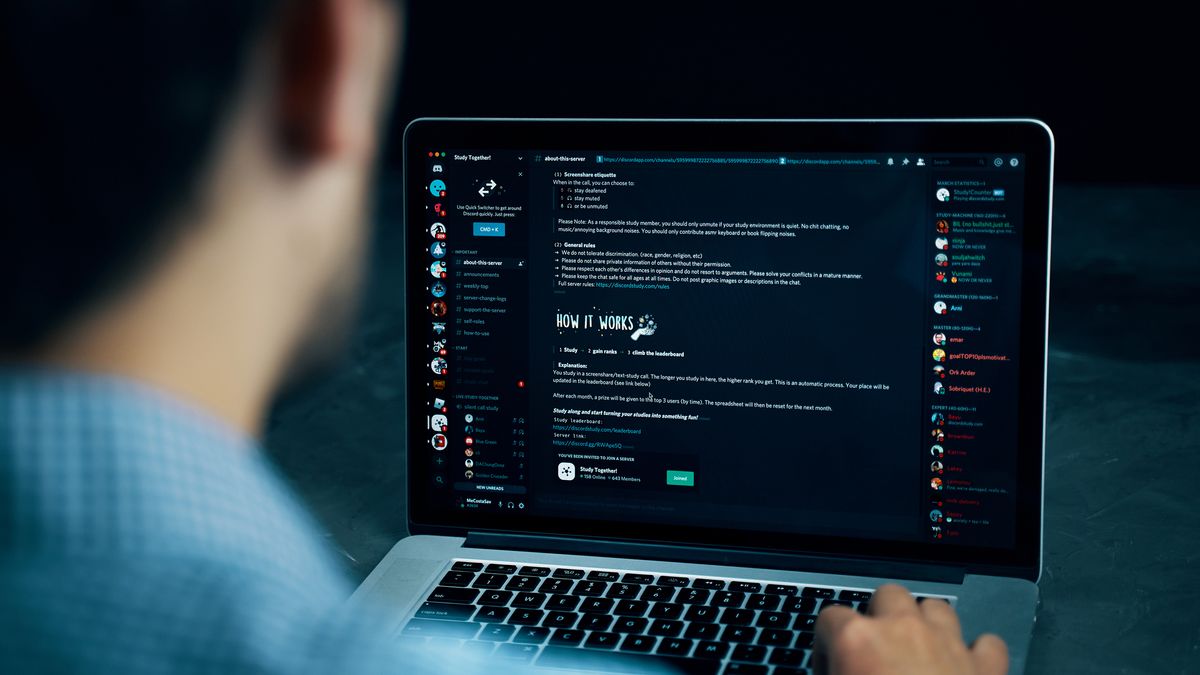 The Discord application displayed on a laptop