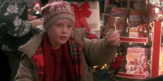 Macauley Culkin holding a very small fraction of Home Alone's box office earnings