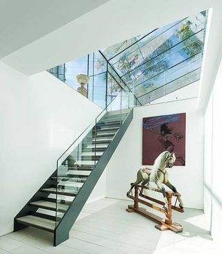 contemporary staircase with open tread