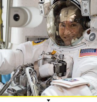 Astronaut Christina Koch is suited up in a U.S. spacesuit before beginning a seven hour and one minute spacewalk in October 2019 to upgrade the station’s large nickel-hydrogen batteries with newer lithium-ion batteries.
