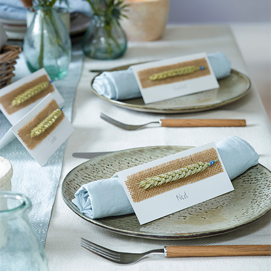 corn place setting with plate cloth and fork