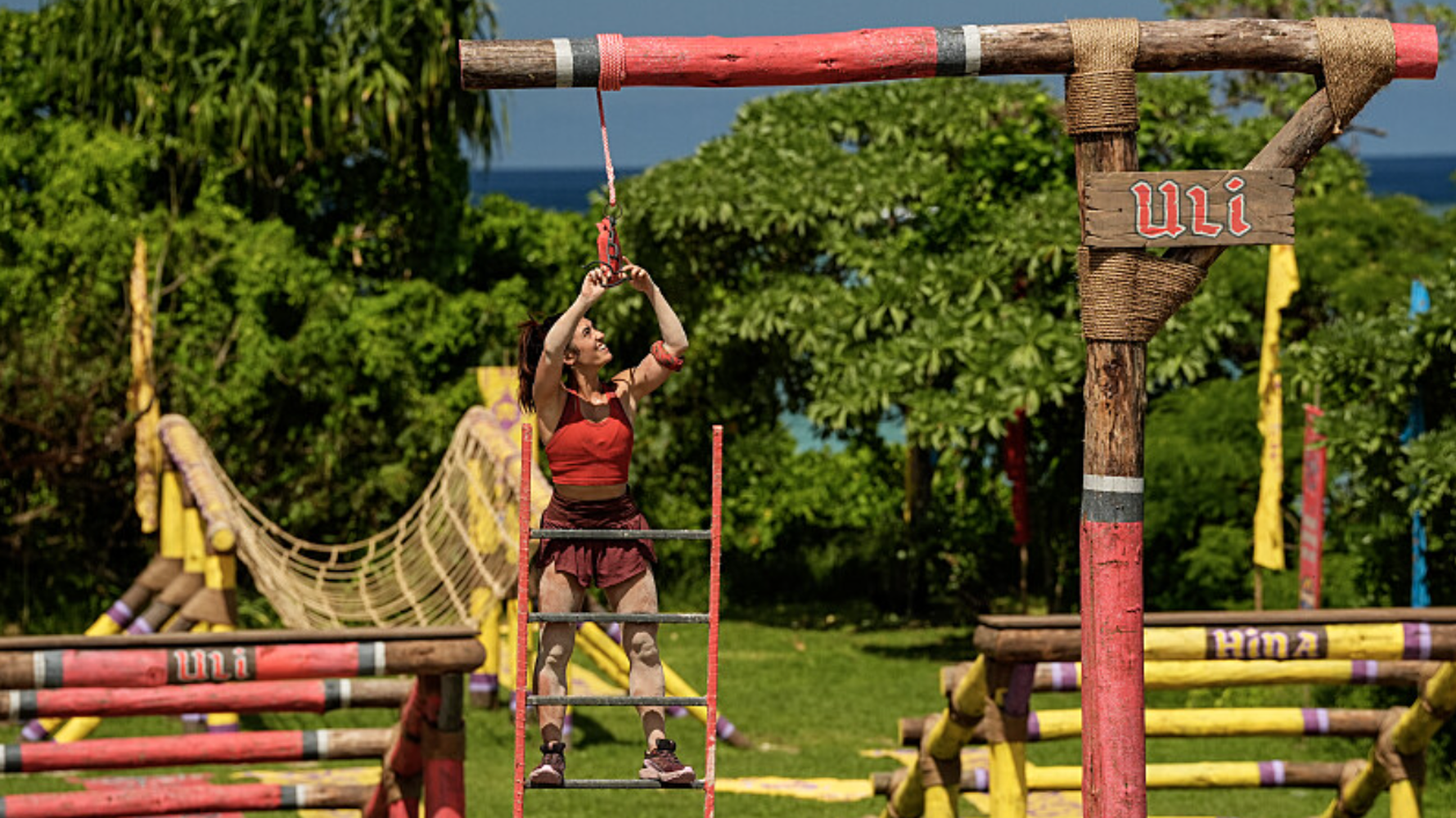 Savannah Louie navigating an obstacle course in Survivor 49