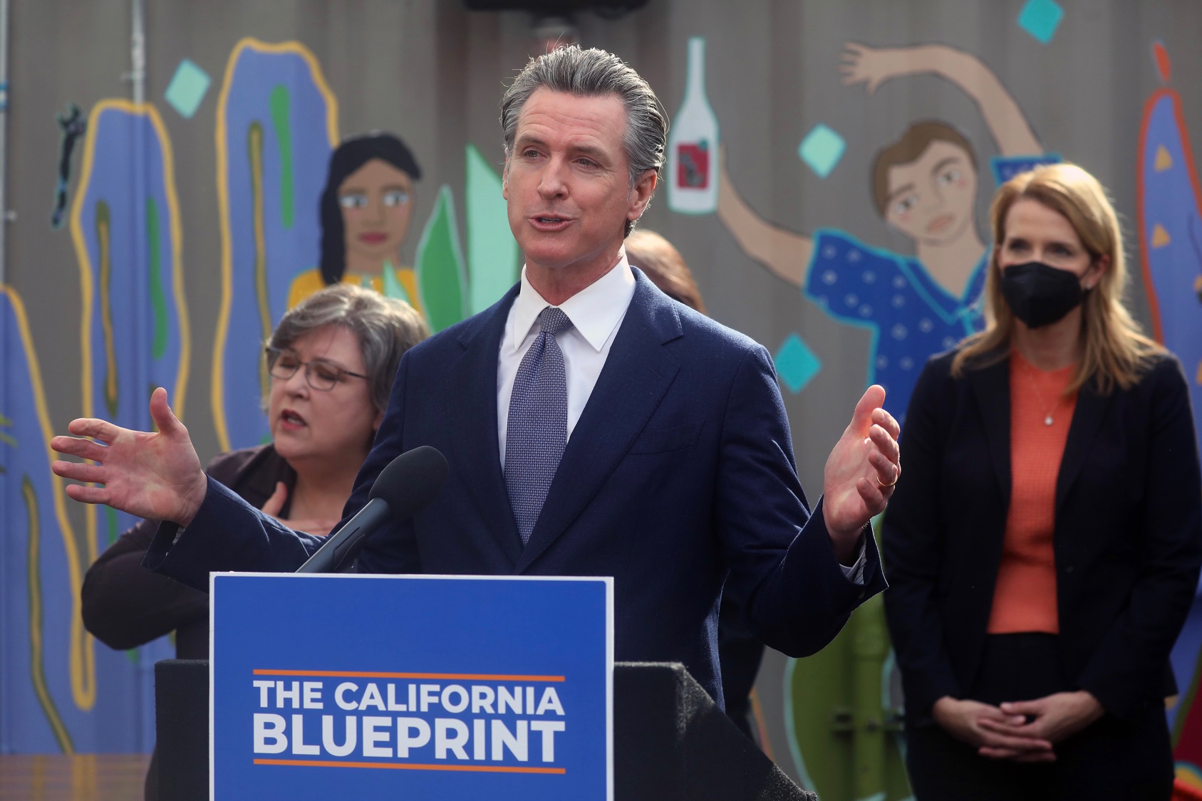 OAKLAND, CA - FEBRUARY 9: Governor Gavin Newsom speaks at a press conference on Wednesday, Feb. 9, 2022, in Oakland, Calif. Newsom signed legislation to extend COVID-19 supplemental paid sick leave for workers and bolster Californias support for small businesses.