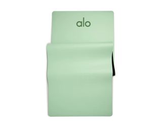 Image of green Alo yoga mat unrolled