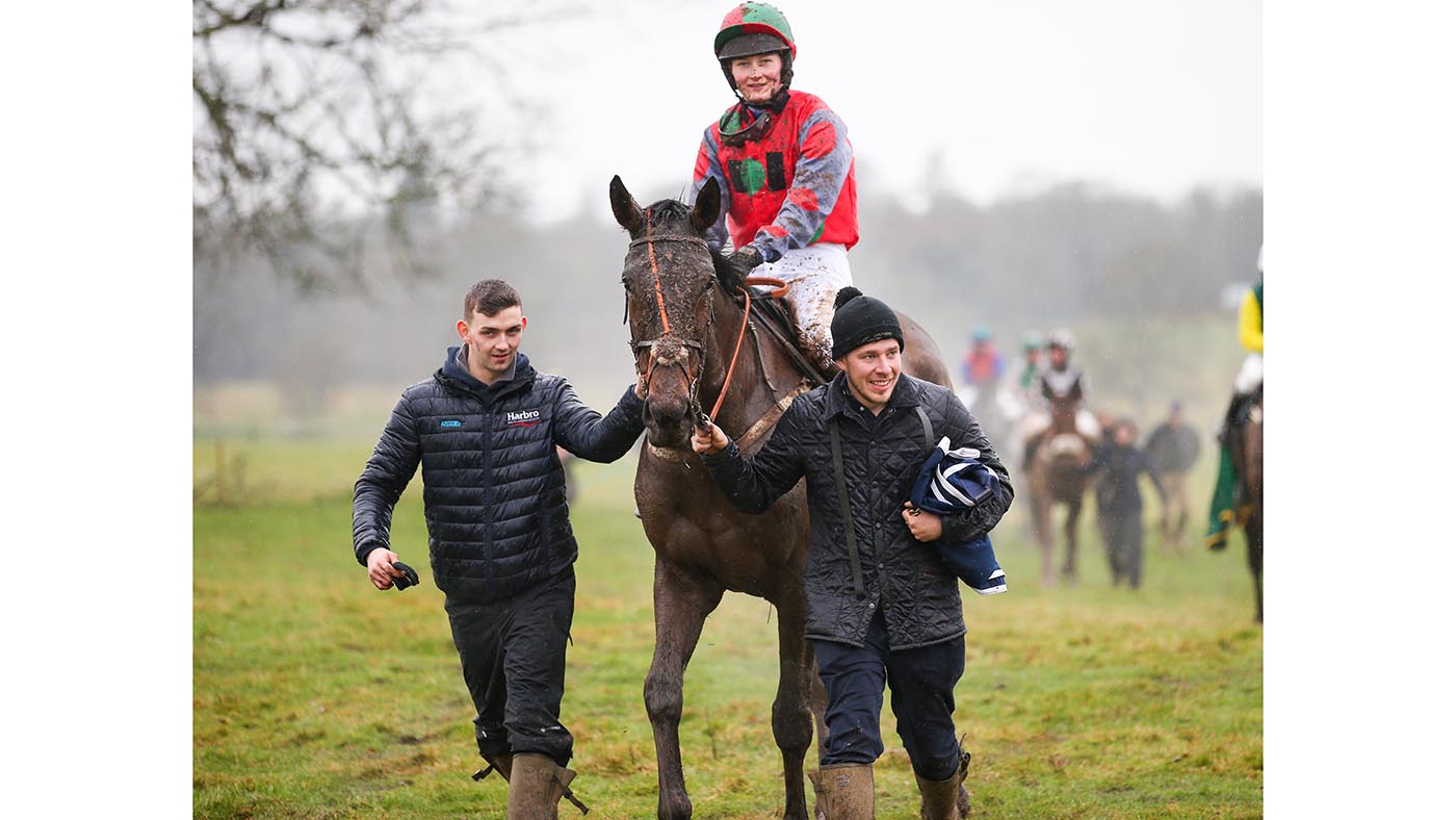OSCAR WILDE and Amy Coltherd win the Ladies Open on her first ride at Berwickshire Hunt Point-To-Point , Friars Haugh Kelso 13/2/22 Photo by Marcia Thompson -GROSSICK RACING The Steadings Rockhallhead Collin DG1 4JW 07710461723 www.grossick.co.uk JOHN GROSSICK
