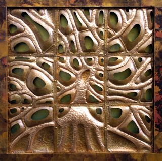 Hammered copper artwork in form of tree