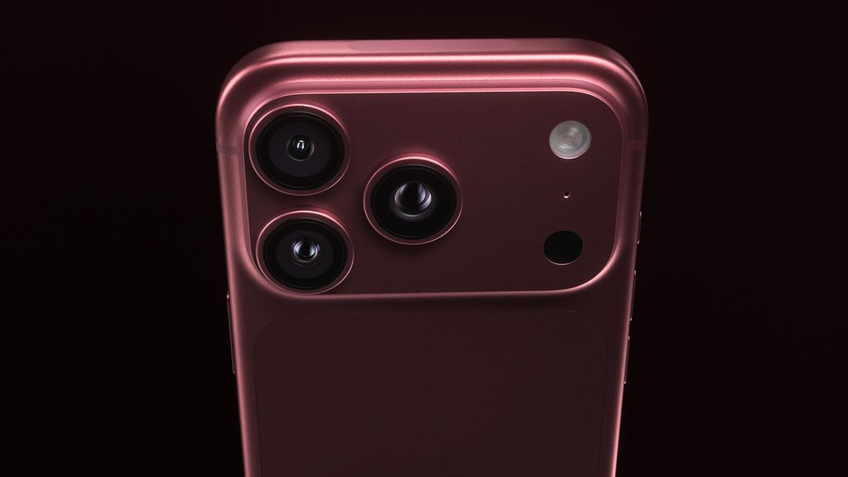 The back of a burgundy iPhone 18 Pro on a black background.