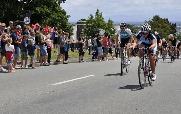A large crowd has gathered half way up the climb...