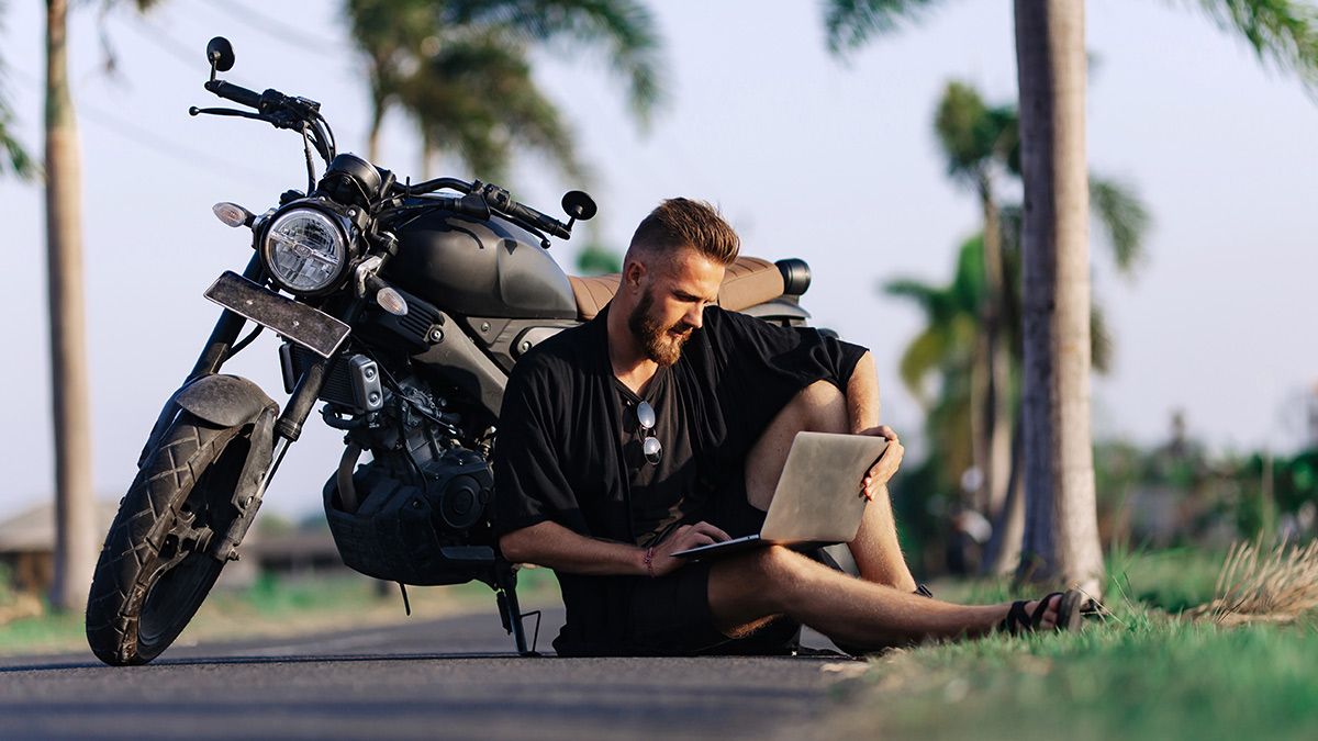 Creative professionals using their equipment to work outdoors.