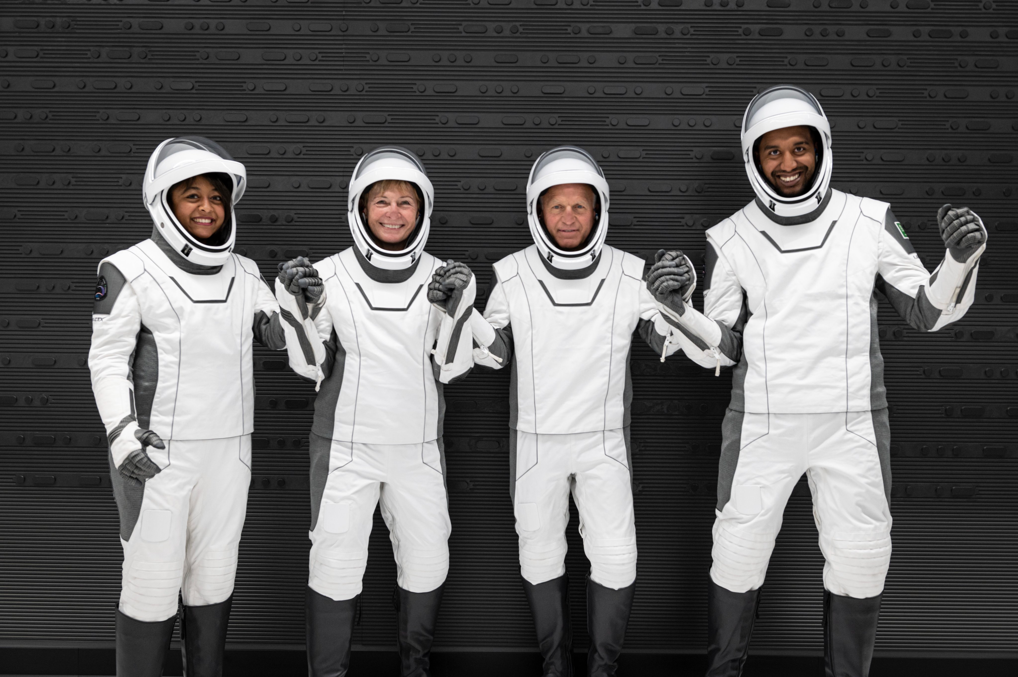 The Axiom Space Ax-2 private astronaut crew in their SpaceX spacesuits