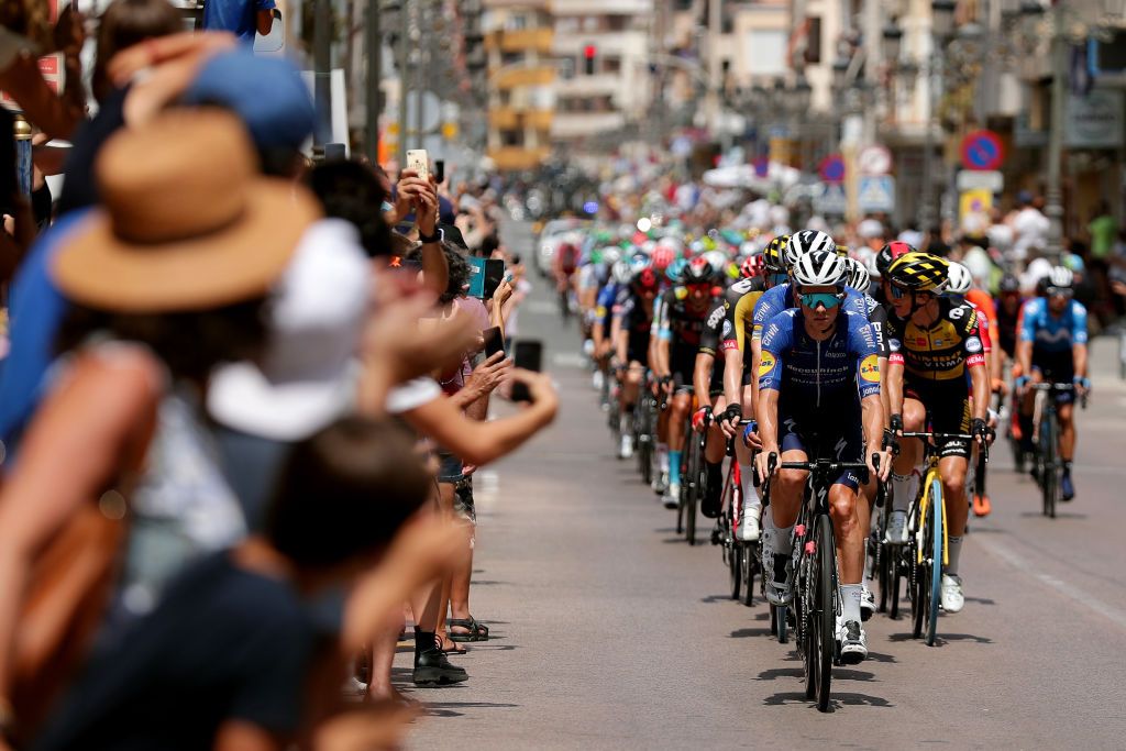 Deceuninck-QuickStep ride on the front as the summer crowds cheer the Vuelta along