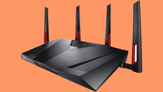 A product shot of the Asus DSL-AC88U on an orange background.