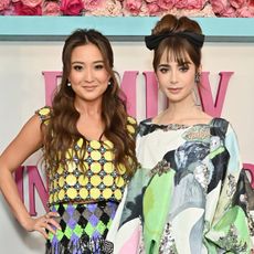 Ashley Park and Lily Collins at the premiere of Emily in Paris