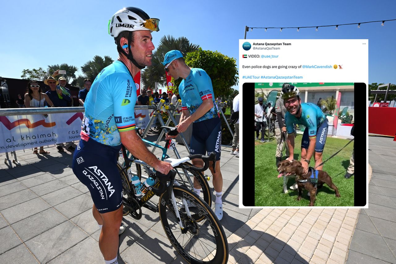 Mark Cavendish at the UAE Tour holding his bike