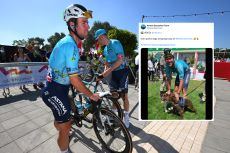 Mark Cavendish at the UAE Tour holding his bike