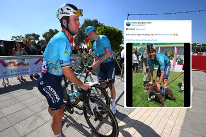 Mark Cavendish at the UAE Tour holding his bike