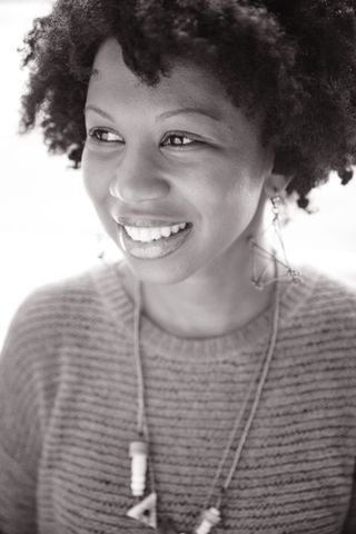 woman smiling in black and white