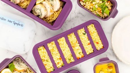 A set of deep purple silicone food storage split into strips, filled with rice. 