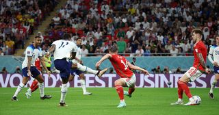Marcus Rashford of England scores their team's third goal during the FIFA World Cup Qatar 2022 Group B match between Wales and England at Ahmad Bin Ali Stadium on November 29, 2022 in Doha, Qatar.