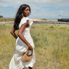 A woman outside in a field