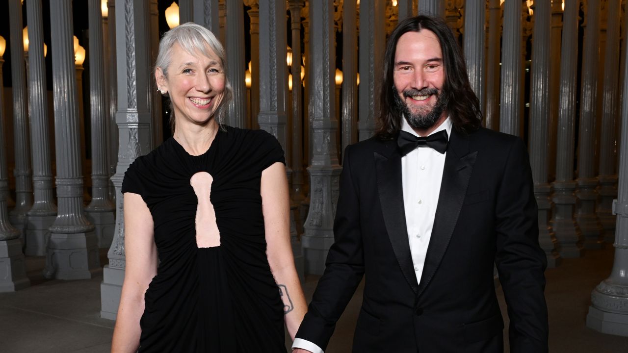 Alexandra Grant in a black gown and Keanu Reeves in a tux at the 2023 LACMA Art+Film Gala on November 4, 2023