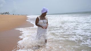 Delisha Marshall on Ouidah Beach in Clotilda: The Return Home