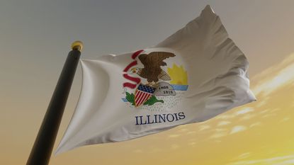 Illinois flag flying in the sky for Illinois state tax story