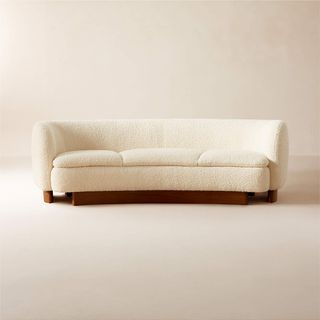 Cream boucle curved sofa