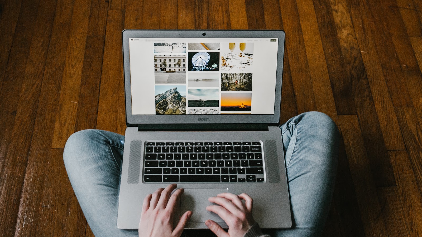 person working with laptop on lap