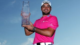 Jason Day of Australia celebrates with the trophy after winning during the final round of THE PLAYERS Championship at the Stadium course at TPC Sawgrass on May 15, 2016