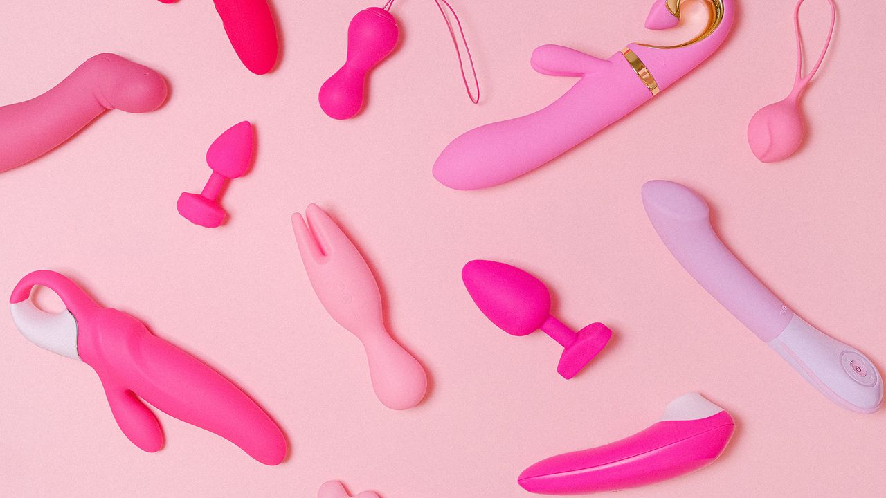 best vibrator: range of vibrators and sex toys on a pink background