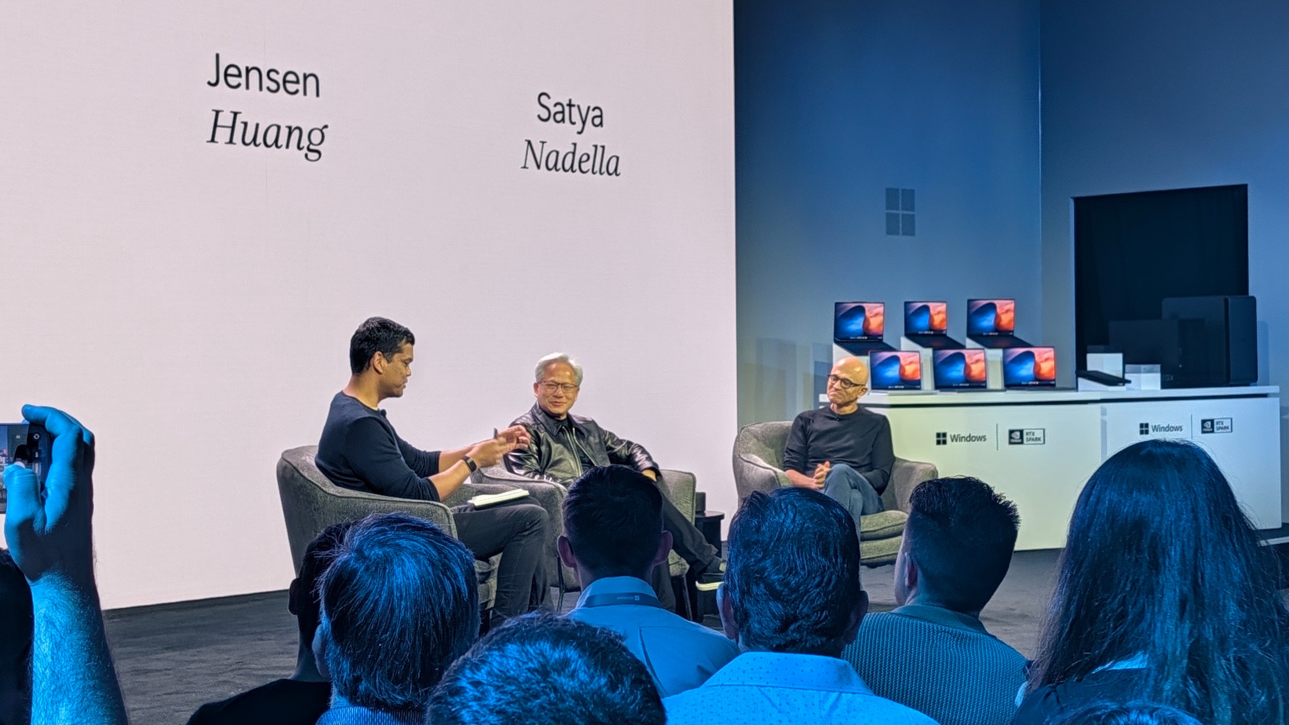 Satya and Jensen on stage discussing Windows at Microsoft Surface Laptop Ultra event