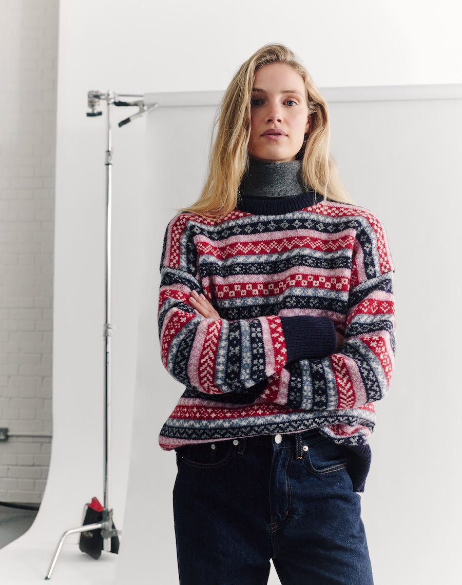 a model wearing a shetland jumper from navygrey