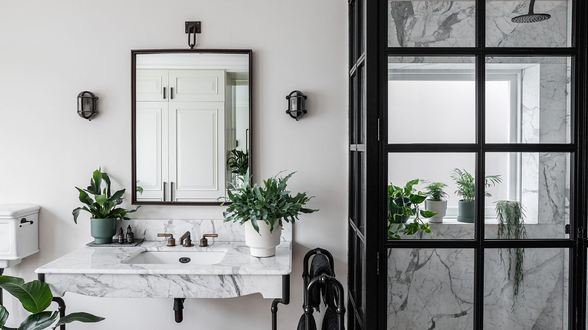 Sleek and Modern Two-Way Mirror Public Restroom
