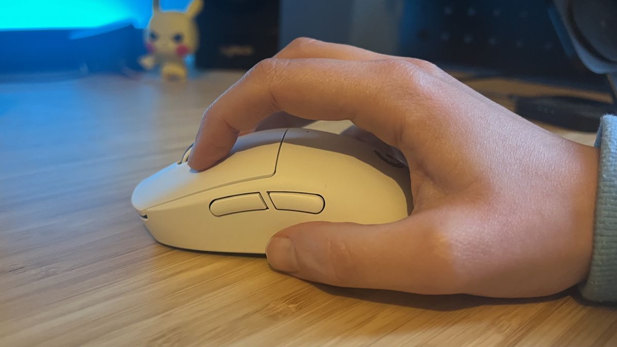 Hand using Logitech G Pro X Superlight 2c gaming mouse in claw grip